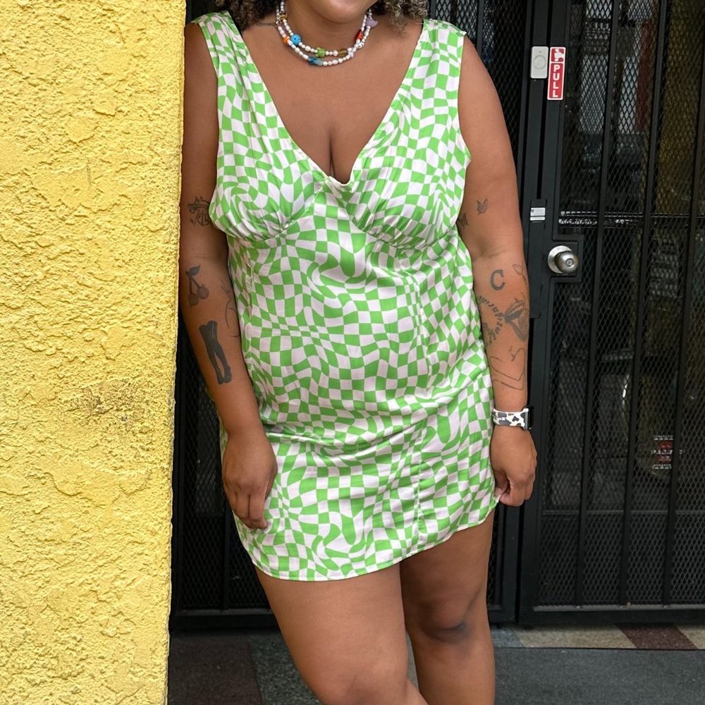 ASOS DESIGN Curve button side satin mini dress in green checkerboard print